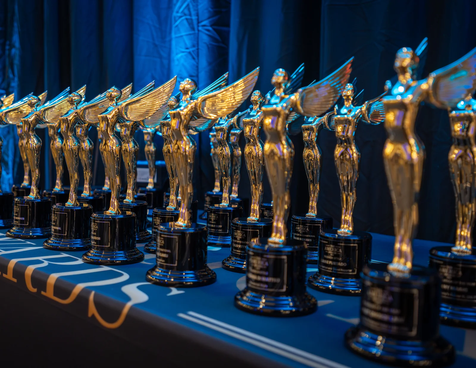 Row of The America Awards trophies