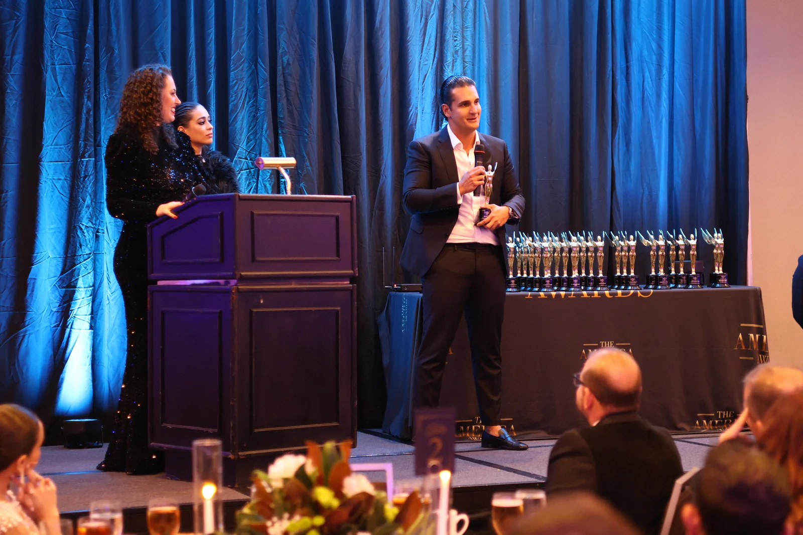 Award presentation on stage during the ceremony