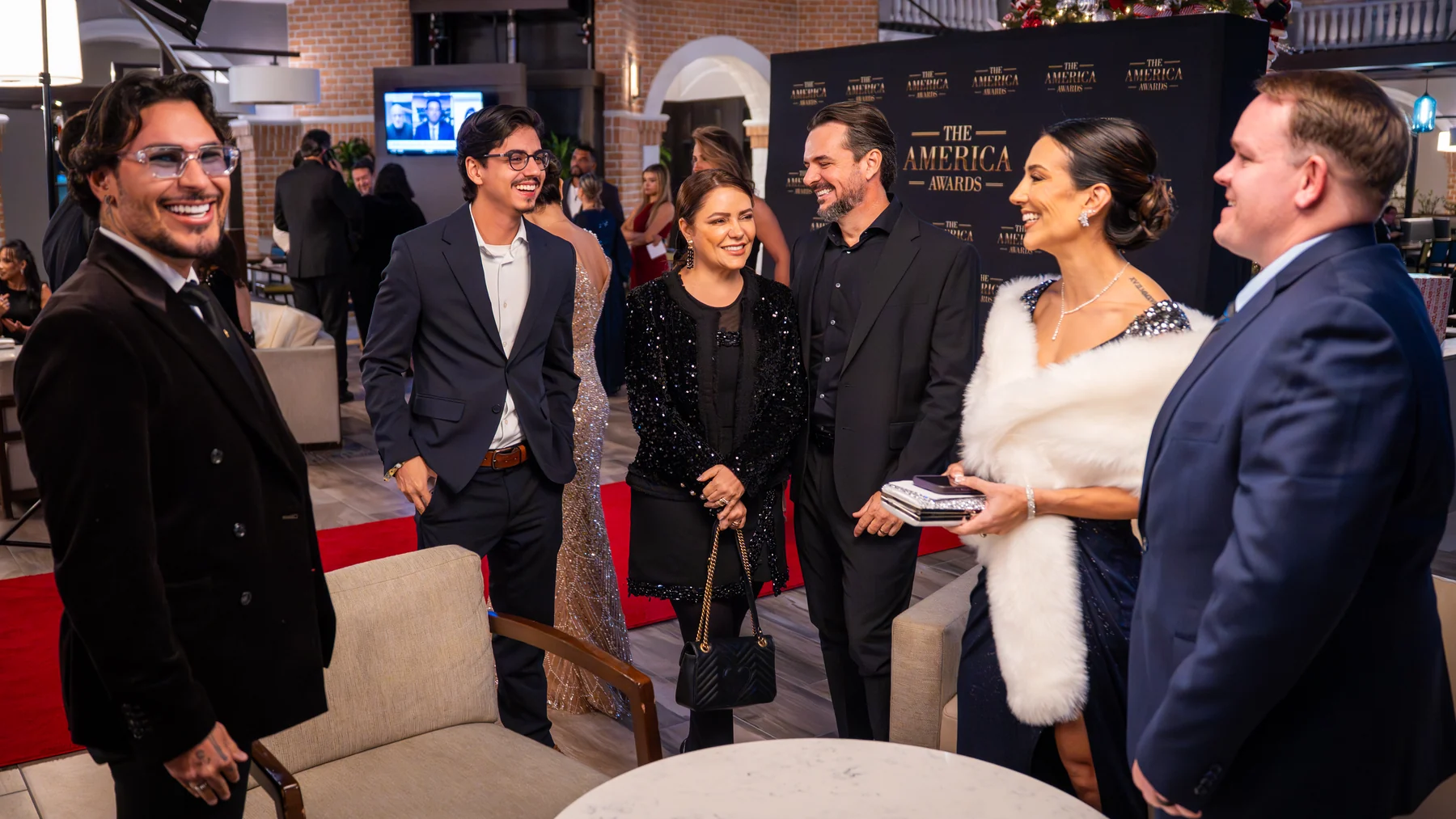 Guests connecting at The America Awards networking reception