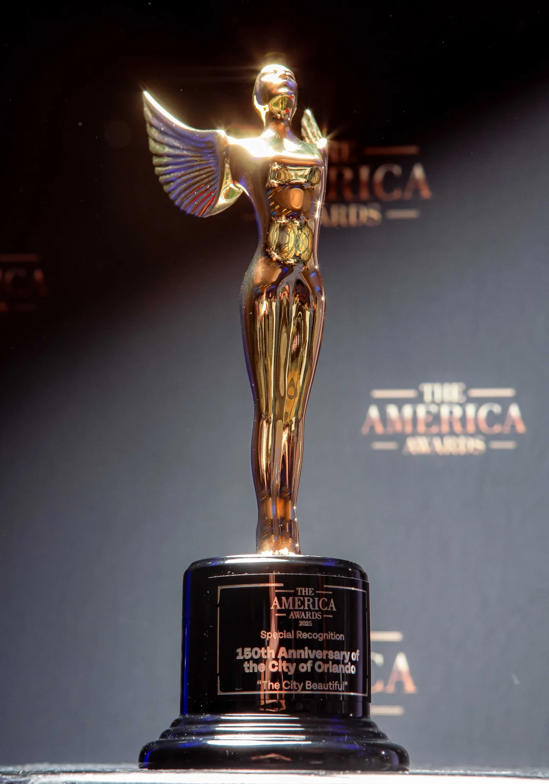 The official America Awards trophy, engraved for Special Recognition, 150th Anniversary of the City of Orlando